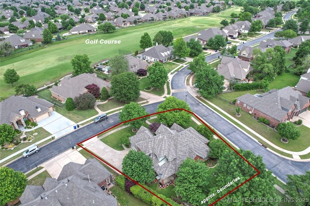 aerial view of residential area featuring property boundaries highlighted and a golf course