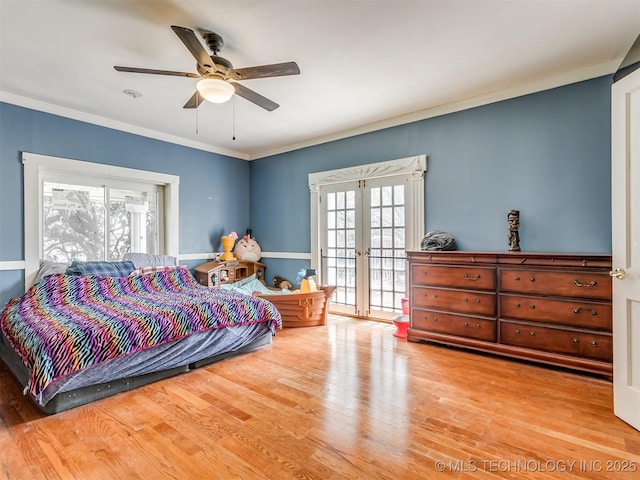 2831 S 24th St W, Muskogee, OK 74401 - bedroom with access to outside, french doors, wood finished floors, ornamental molding, and ceiling fan