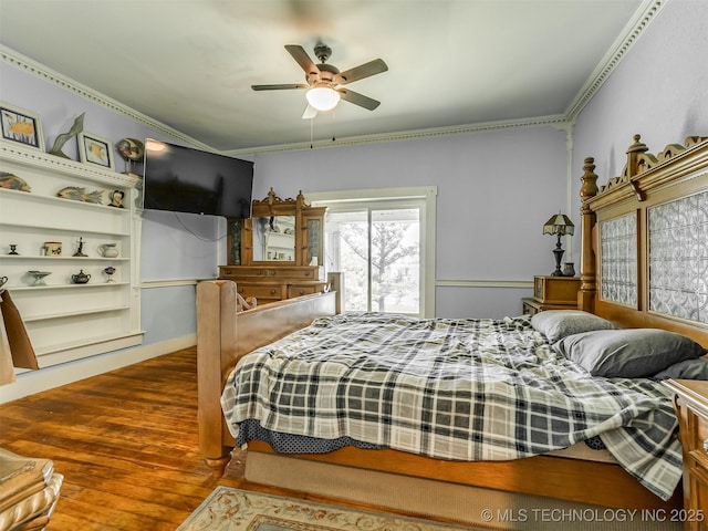 2831 S 24th St W, Muskogee, OK 74401 - bedroom with wood finished floors, ornamental molding, and a ceiling fan