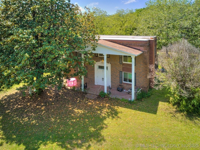 2831 S 24th St W, Muskogee, OK 74401 - greek revival inspired property featuring brick siding and a front yard