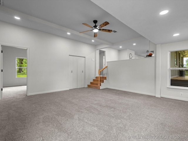 empty room featuring recessed lighting, carpet, plenty of natural light, and a ceiling fan