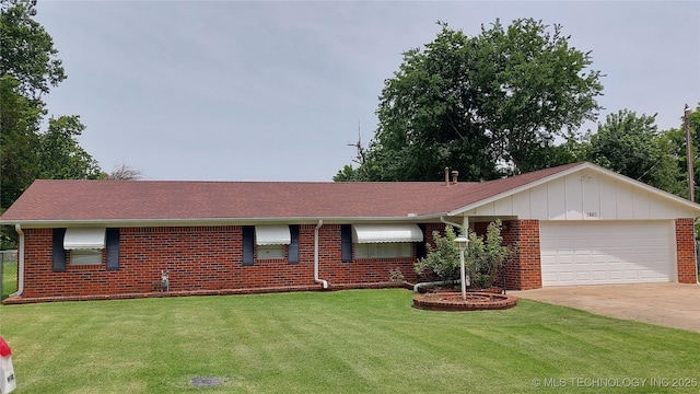 1601 S 165th W Ave, Sand Springs, OK 74063 - ranch-style home featuring brick siding, an attached garage, a front yard, and driveway