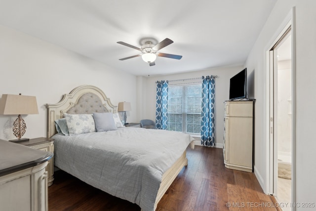 bedroom featuring dark wood-type flooring, ceiling fan, and baseboards