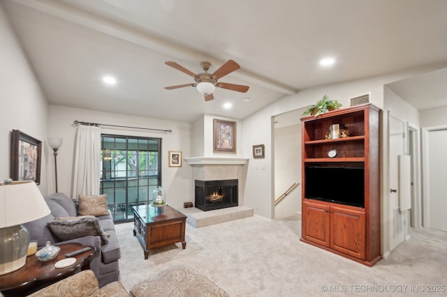 6522 S Memorial Dr Unit 19-H, Tulsa, OK 74133 - living room featuring ceiling fan, a fireplace, light carpet, and recessed lighting