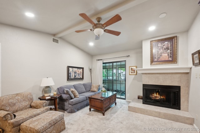 6522 S Memorial Dr Unit 19-H, Tulsa, OK 74133 - living area featuring a tile fireplace, a ceiling fan, carpet flooring, and recessed lighting