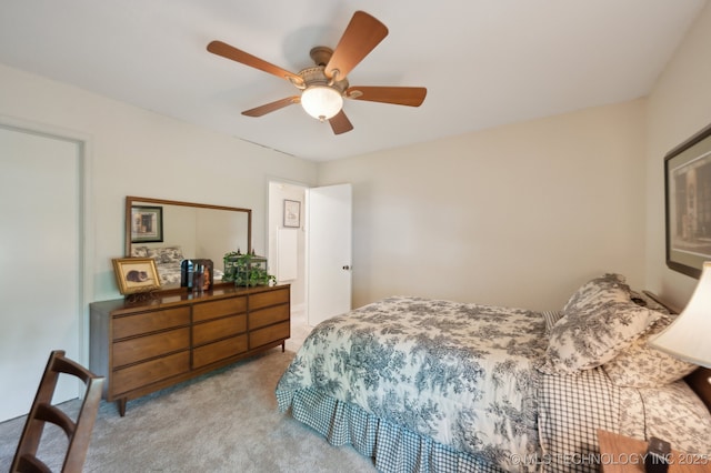 6522 S Memorial Dr Unit 19-H, Tulsa, OK 74133 - bedroom with carpet and ceiling fan