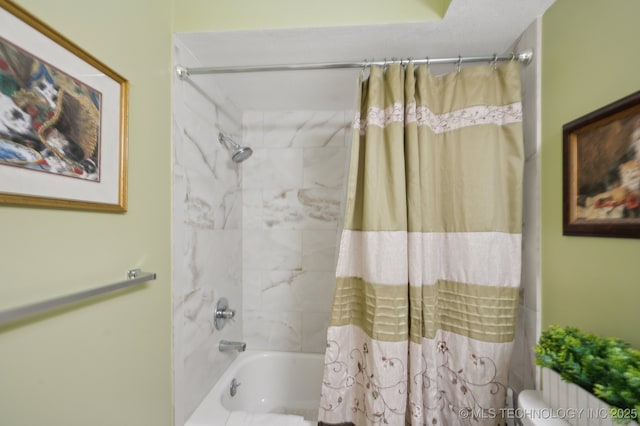 6522 S Memorial Dr Unit 19-H, Tulsa, OK 74133 - bathroom featuring shower / bathtub combination with curtain and toilet