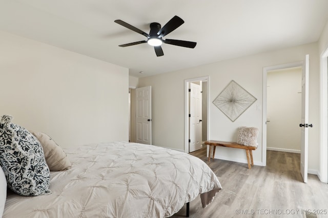 1901 W Indianola St, Broken Arrow, OK 74012 - bedroom featuring wood finished floors, baseboards, and ceiling fan