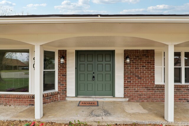 1901 W Indianola St, Broken Arrow, OK 74012 - entrance to property featuring brick siding and covered porch