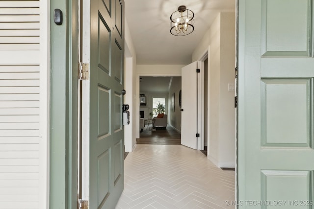 1901 W Indianola St, Broken Arrow, OK 74012 - hall with a chandelier and baseboards