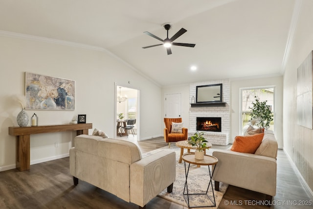1901 W Indianola St, Broken Arrow, OK 74012 - living room with wood finished floors, a ceiling fan, a fireplace, ornamental molding, and vaulted ceiling