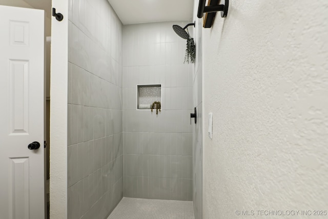 1901 W Indianola St, Broken Arrow, OK 74012 - full bathroom featuring a textured wall and a tile shower