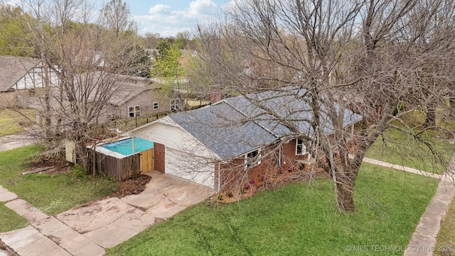 1901 W Indianola St, Broken Arrow, OK 74012 - view of property exterior with driveway, a yard, and brick siding