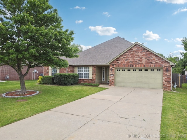 4025 S 217th E Ave, Broken Arrow, OK 74014 - view of front of home featuring an attached garage, brick siding, and driveway