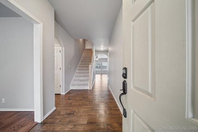 4025 S 217th E Ave, Broken Arrow, OK 74014 - foyer featuring dark wood-style flooring, arched walkways, baseboards, and stairs