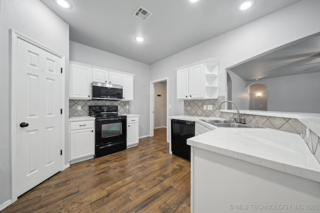 4025 S 217th E Ave, Broken Arrow, OK 74014 - kitchen featuring black appliances, a sink, dark wood-style floors, tasteful backsplash, and recessed lighting