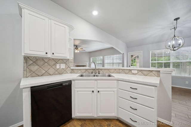 4025 S 217th E Ave, Broken Arrow, OK 74014 - kitchen featuring black dishwasher, a sink, a peninsula, dark wood finished floors, and recessed lighting