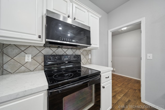 4025 S 217th E Ave, Broken Arrow, OK 74014 - kitchen featuring stainless steel microwave, black electric range oven, light countertops, and white cabinetry