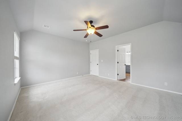 4025 S 217th E Ave, Broken Arrow, OK 74014 - unfurnished bedroom featuring vaulted ceiling, baseboards, carpet floors, ceiling fan, and ensuite bath