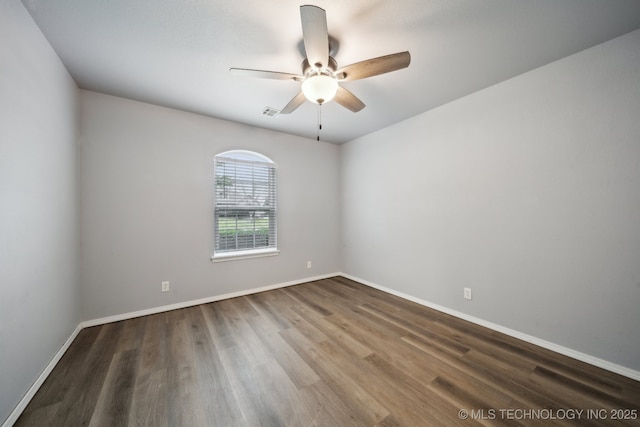 4025 S 217th E Ave, Broken Arrow, OK 74014 - spare room featuring a ceiling fan, wood finished floors, and baseboards