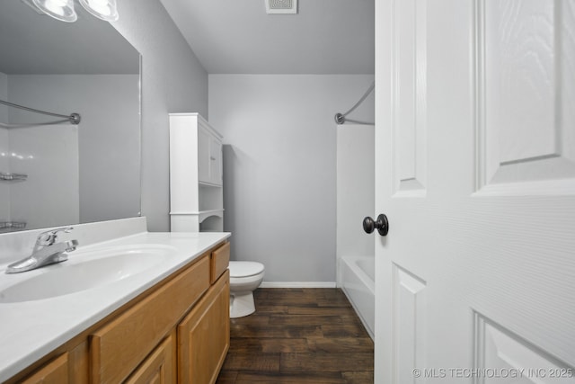 4025 S 217th E Ave, Broken Arrow, OK 74014 - full bathroom featuring wood finished floors, vanity,  shower combination, toilet, and baseboards