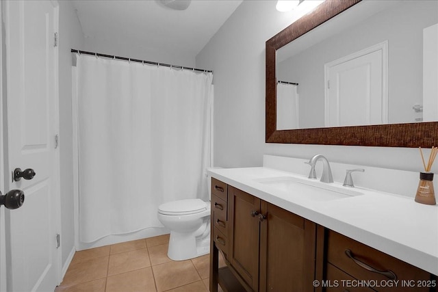 full bath featuring vanity, tile patterned flooring, toilet, and a shower with shower curtain