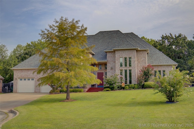 1310 N Northridge Ct, Sand Springs, OK 74063 - french country style house featuring concrete driveway, roof with shingles, and a front lawn