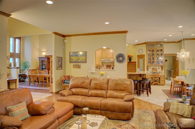 1310 N Northridge Ct, Sand Springs, OK 74063 - living room featuring crown molding, recessed lighting, a chandelier, and arched walkways