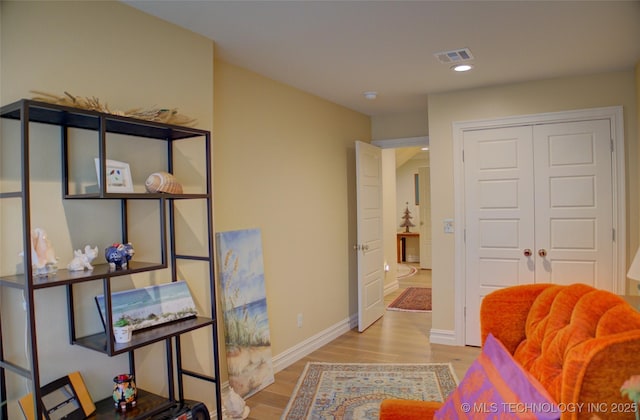 1310 N Northridge Ct, Sand Springs, OK 74063 - living area with wood finished floors, recessed lighting, and baseboards