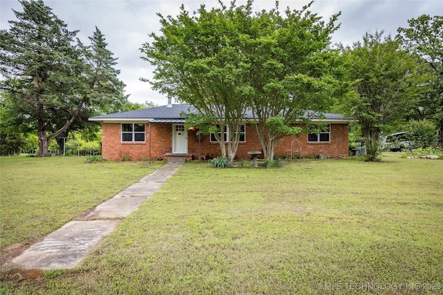 5700 S Wiley Rd, Milburn, OK 73450 - ranch-style house featuring a front yard and brick siding