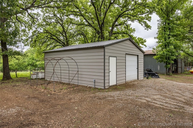 5700 S Wiley Rd, Milburn, OK 73450 - detached garage with driveway