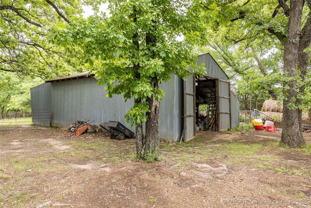 5700 S Wiley Rd, Milburn, OK 73450 - view of pole building featuring fence