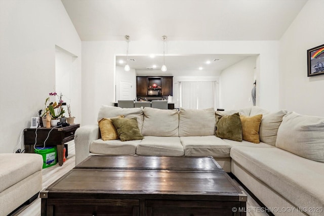 living area featuring recessed lighting
