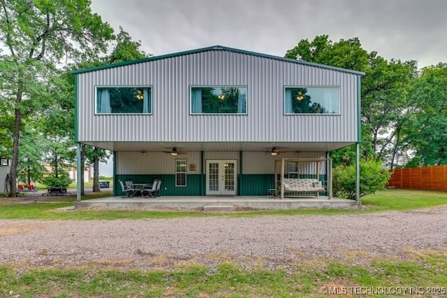 1694 Boat Ramp Rd, Kingston, OK 73439 - back of house featuring french doors, a patio, fence, and a ceiling fan