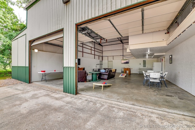1694 Boat Ramp Rd, Kingston, OK 73439 - garage featuring freestanding refrigerator