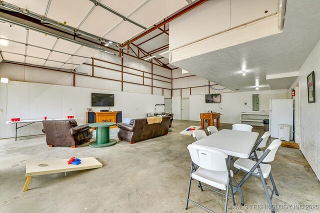 1694 Boat Ramp Rd, Kingston, OK 73439 - dining room featuring concrete flooring and electric panel
