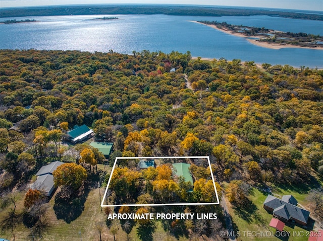 1694 Boat Ramp Rd, Kingston, OK 73439 - view of property location with a nearby body of water, a heavily wooded area, and property boundaries highlighted