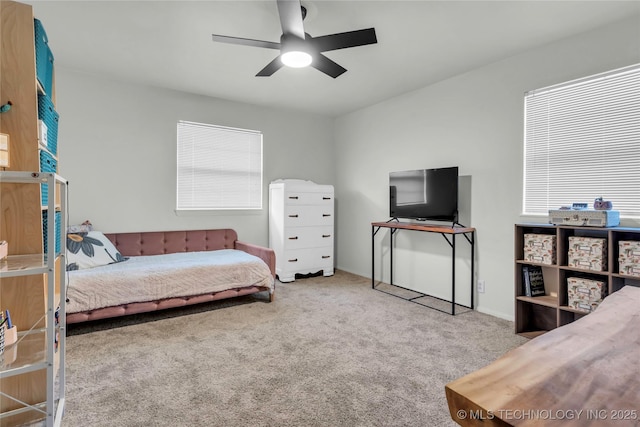 carpeted bedroom featuring a ceiling fan