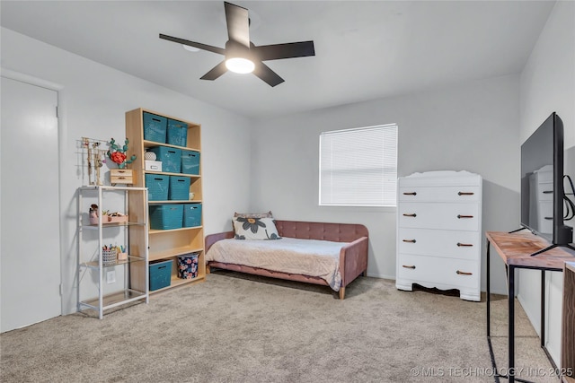 bedroom with carpet flooring and a ceiling fan