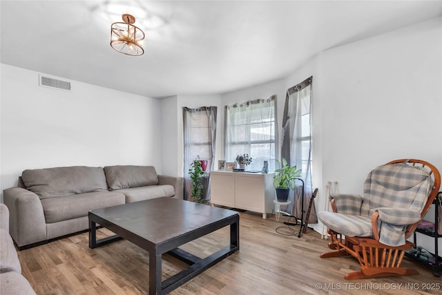living area with wood finished floors