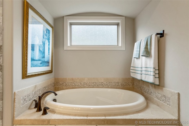 bathroom featuring a bath