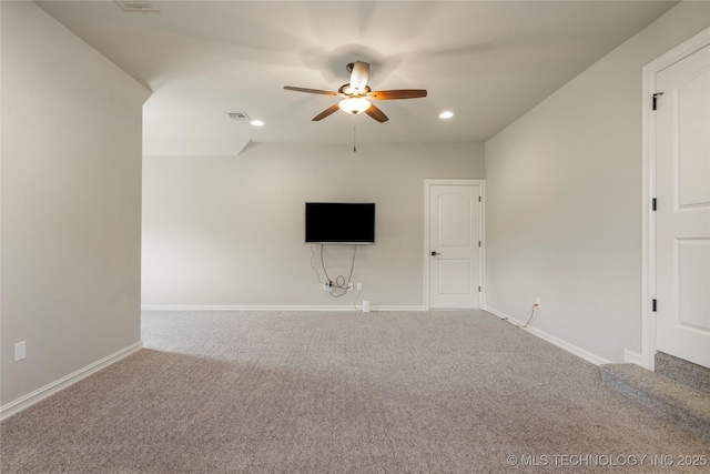 unfurnished living room with carpet, a ceiling fan, baseboards, and recessed lighting