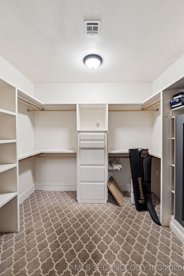 spacious closet with built in study area