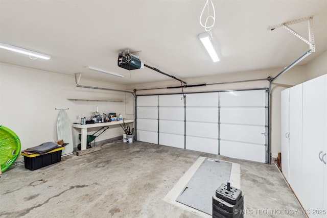 garage featuring a garage door opener