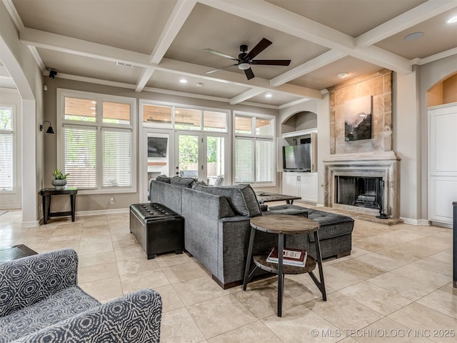 3661 S Lewis Ave, Tulsa, OK 74105 - living area featuring ceiling fan, coffered ceiling, light tile patterned flooring, baseboards, and a large fireplace