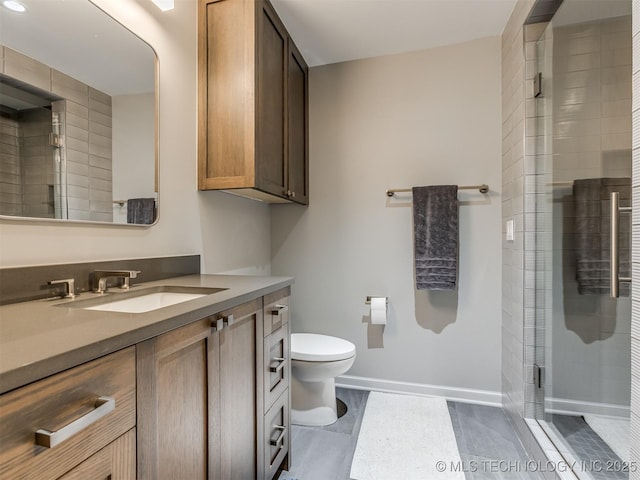 3661 S Lewis Ave, Tulsa, OK 74105 - bathroom featuring toilet, vanity, a shower stall, baseboards, and tile patterned flooring