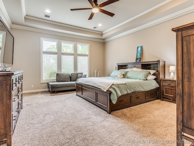 3661 S Lewis Ave, Tulsa, OK 74105 - carpeted bedroom featuring a tray ceiling, multiple windows, ornamental molding, a ceiling fan, and recessed lighting