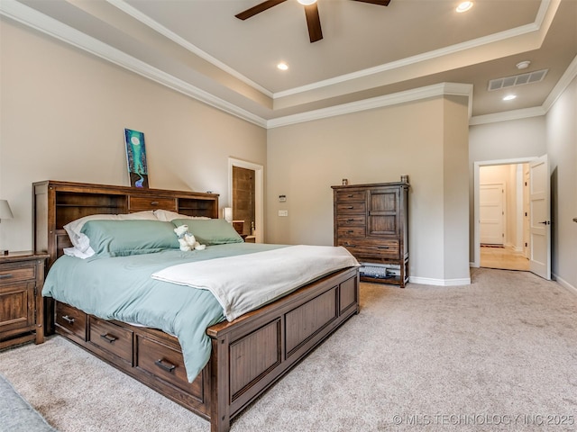 3661 S Lewis Ave, Tulsa, OK 74105 - bedroom featuring light colored carpet, a tray ceiling, crown molding, baseboards, and ceiling fan
