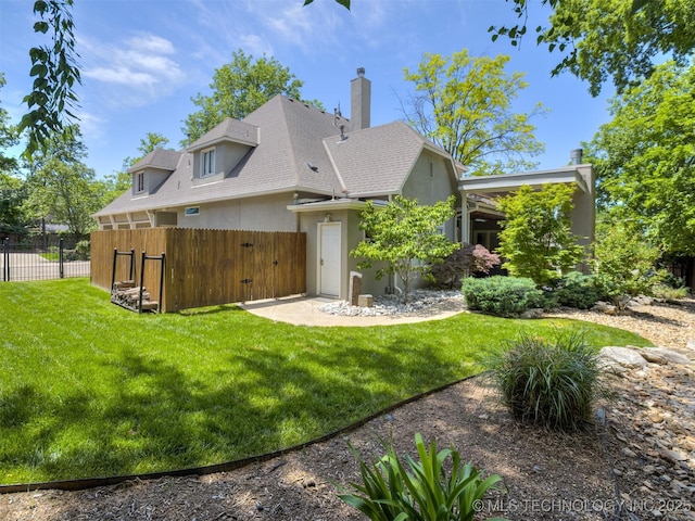 3661 S Lewis Ave, Tulsa, OK 74105 - view of front of home featuring stucco siding, roof with shingles, and a chimney