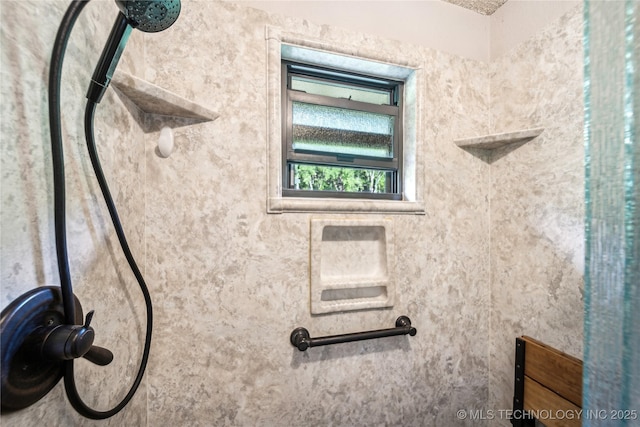 bathroom view of a tile shower